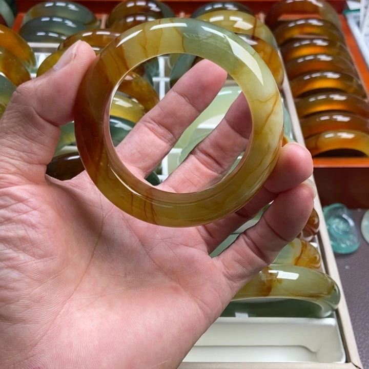 米***多未镶嵌蛇纹石玉手镯手串戒指吊坠