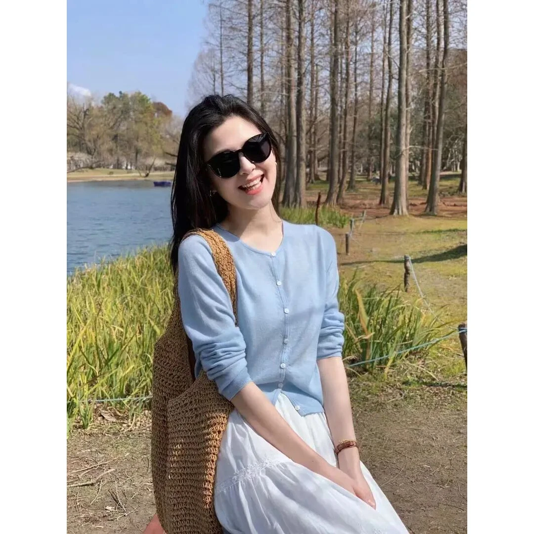 早春新款韩系蓝色针织开衫长袖上衣女装白色蛋糕半身裙套装