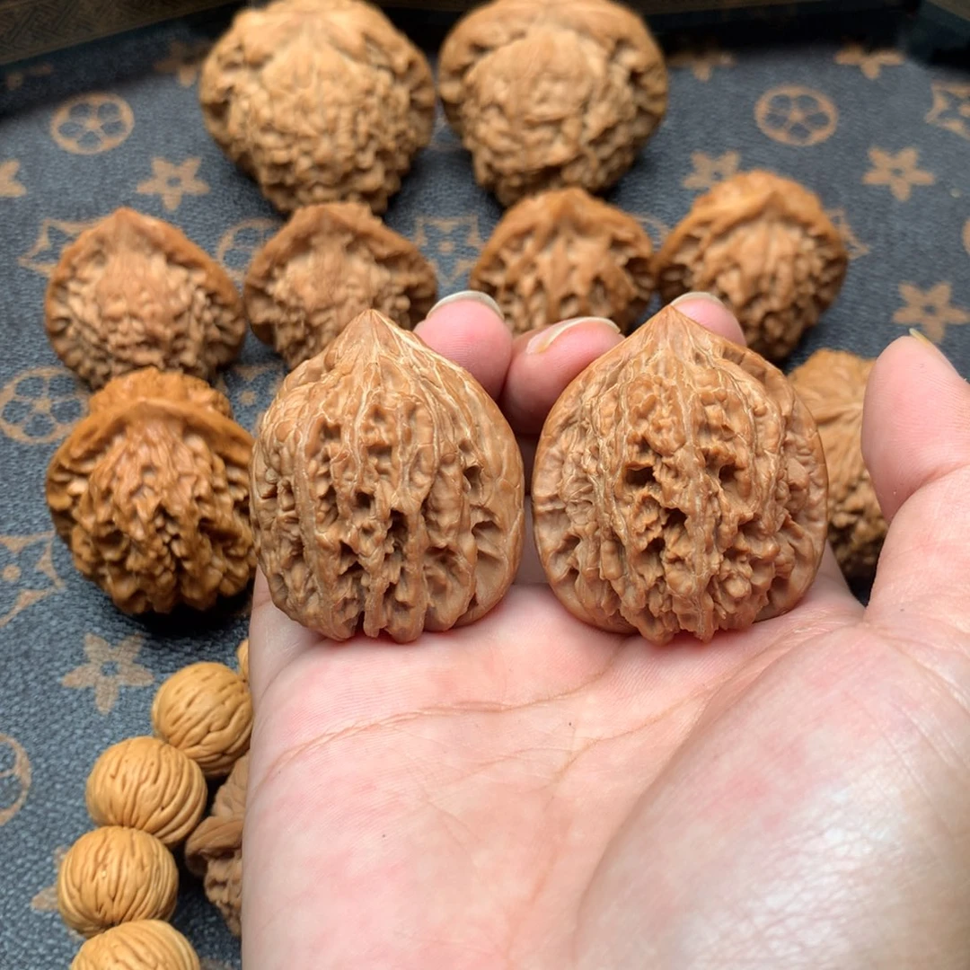 文玩核桃把件九龙筋