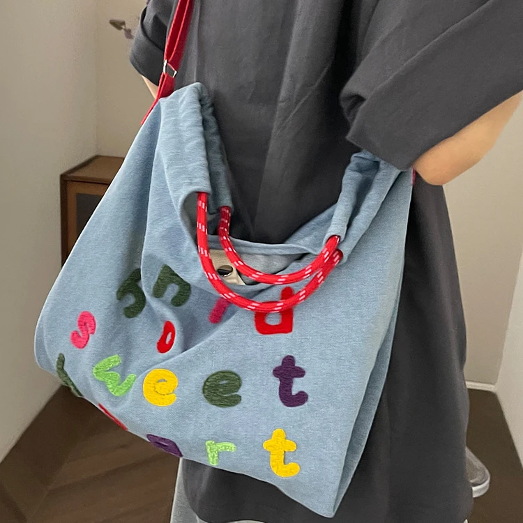 斜挎包女帆布包大容量包包2025新款夏天学生通勤包牛仔单肩托特包