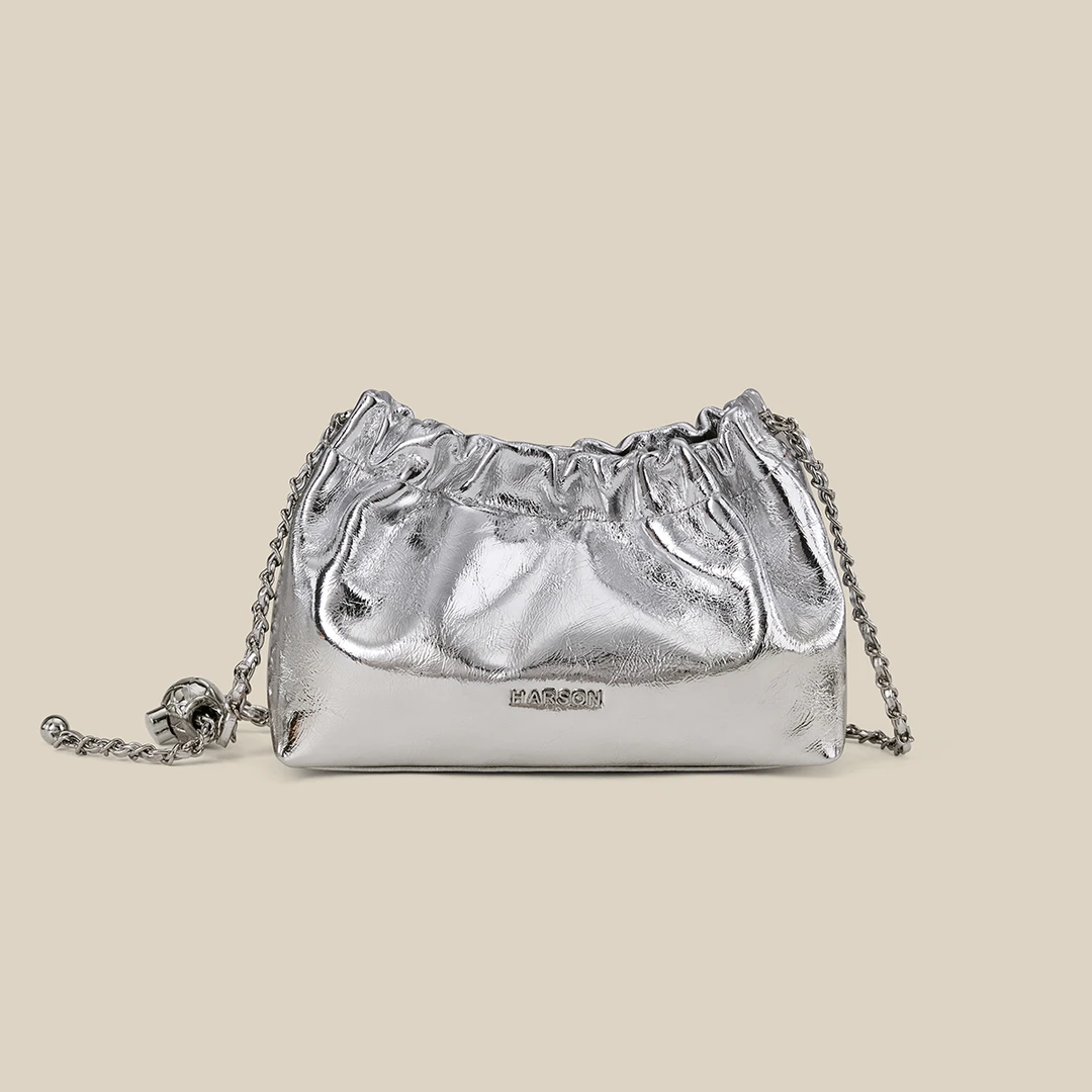 斜挎包韩版水饺形肩包轻奢银色磁扣小众云朵包饺子包单肩