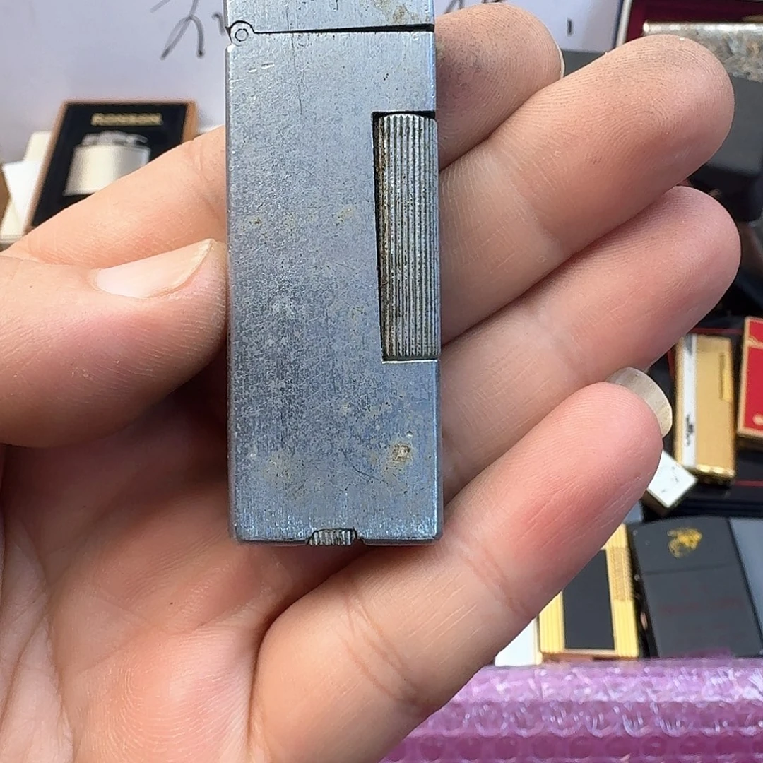 许***，搓轮油条科研打火机