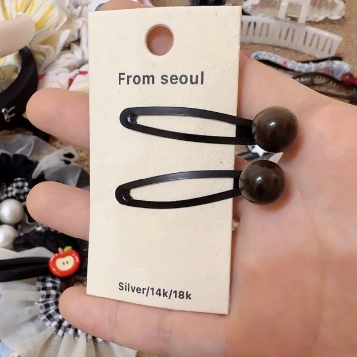 皮质铁合金球球黑色掰掰夹