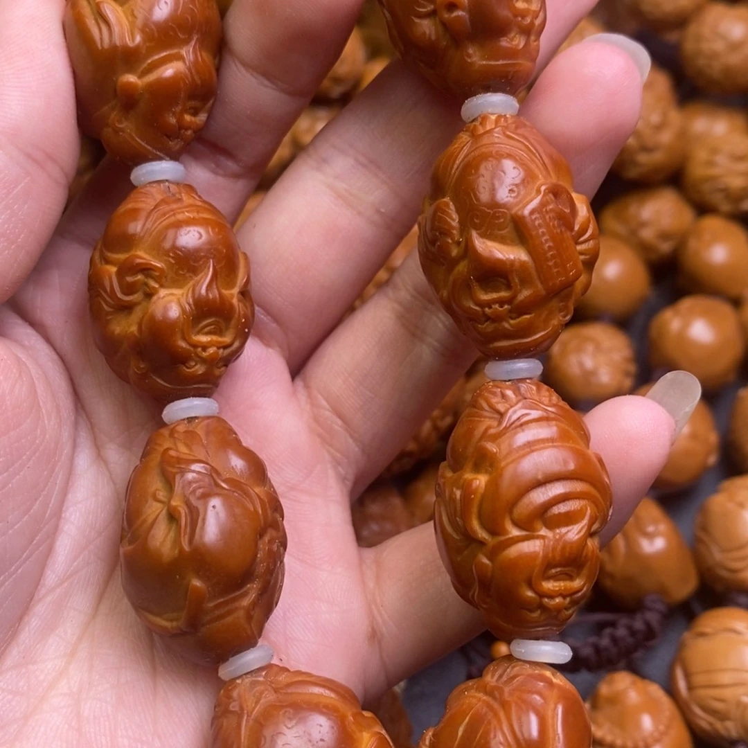 橄榄核吊坠八方来财色差