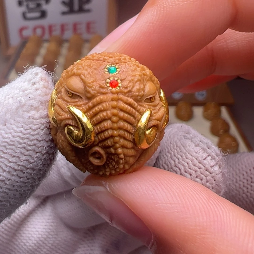 猴头核桃把件有****5镶嵌款象神18左右尺寸有正常封口线