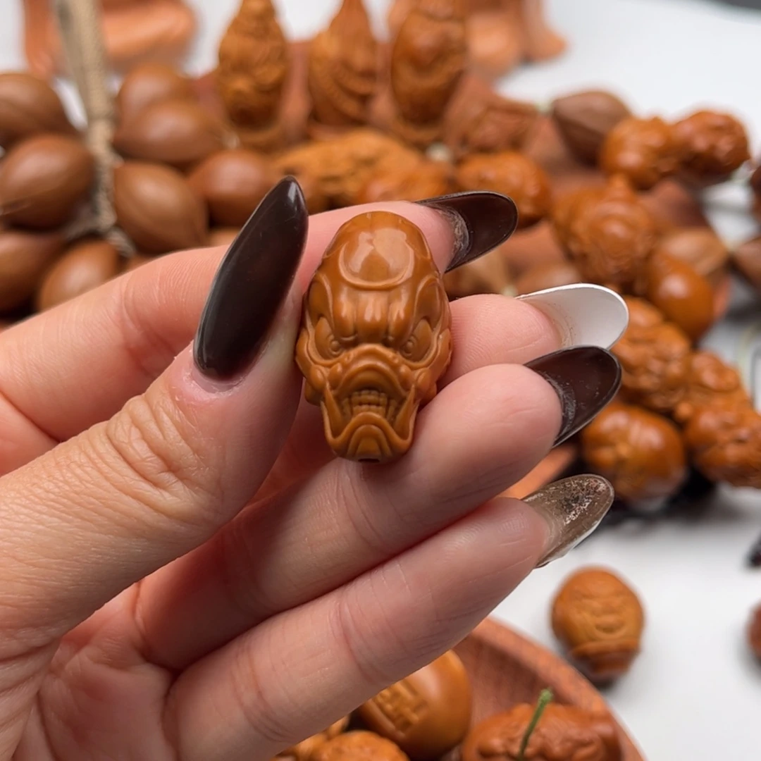 橄榄核吊坠兽面三通