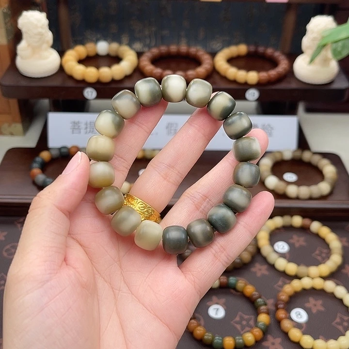 爱***桃吊坠菩提根/象牙果手工干磨小海浪