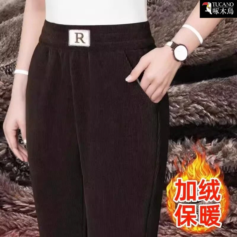 啄木鸟正品2025拼接哈伦裤高腰冬季休闲保暖百搭阔腿洋气小众长裤