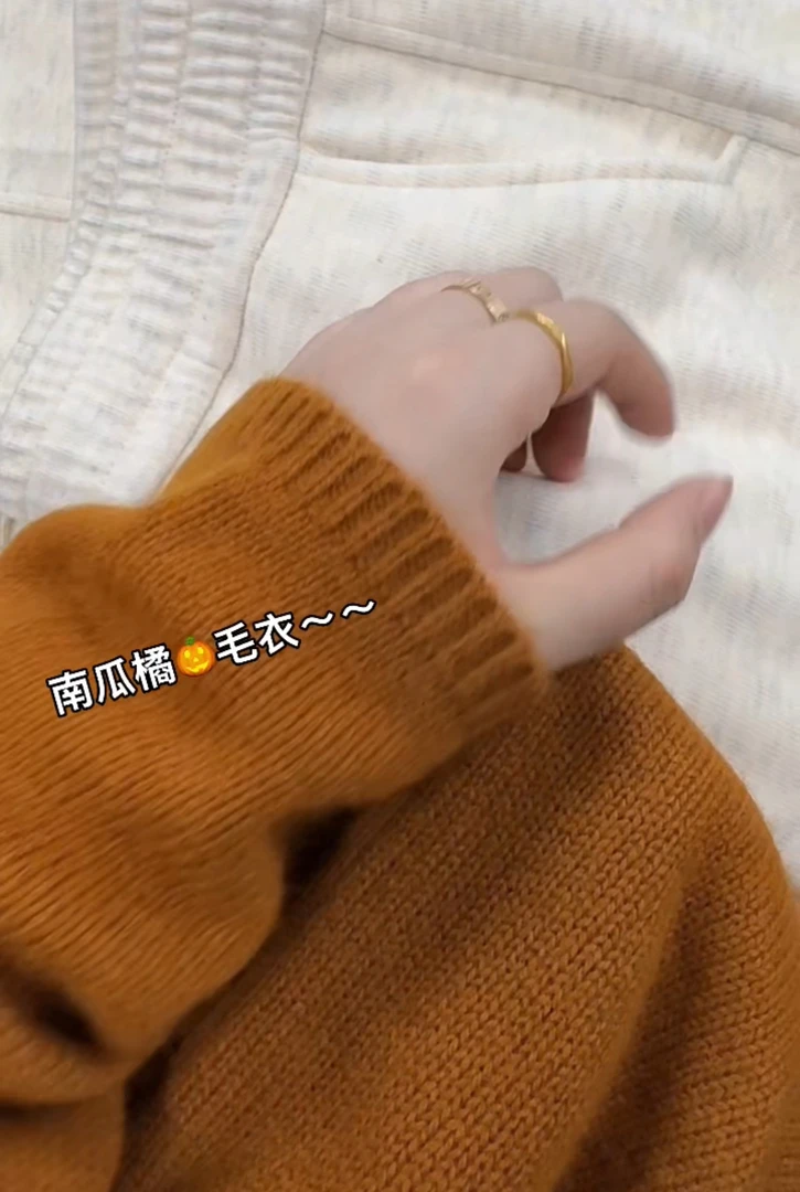 米蓝家名殿好品质显白南瓜橘套头毛衣衫6699