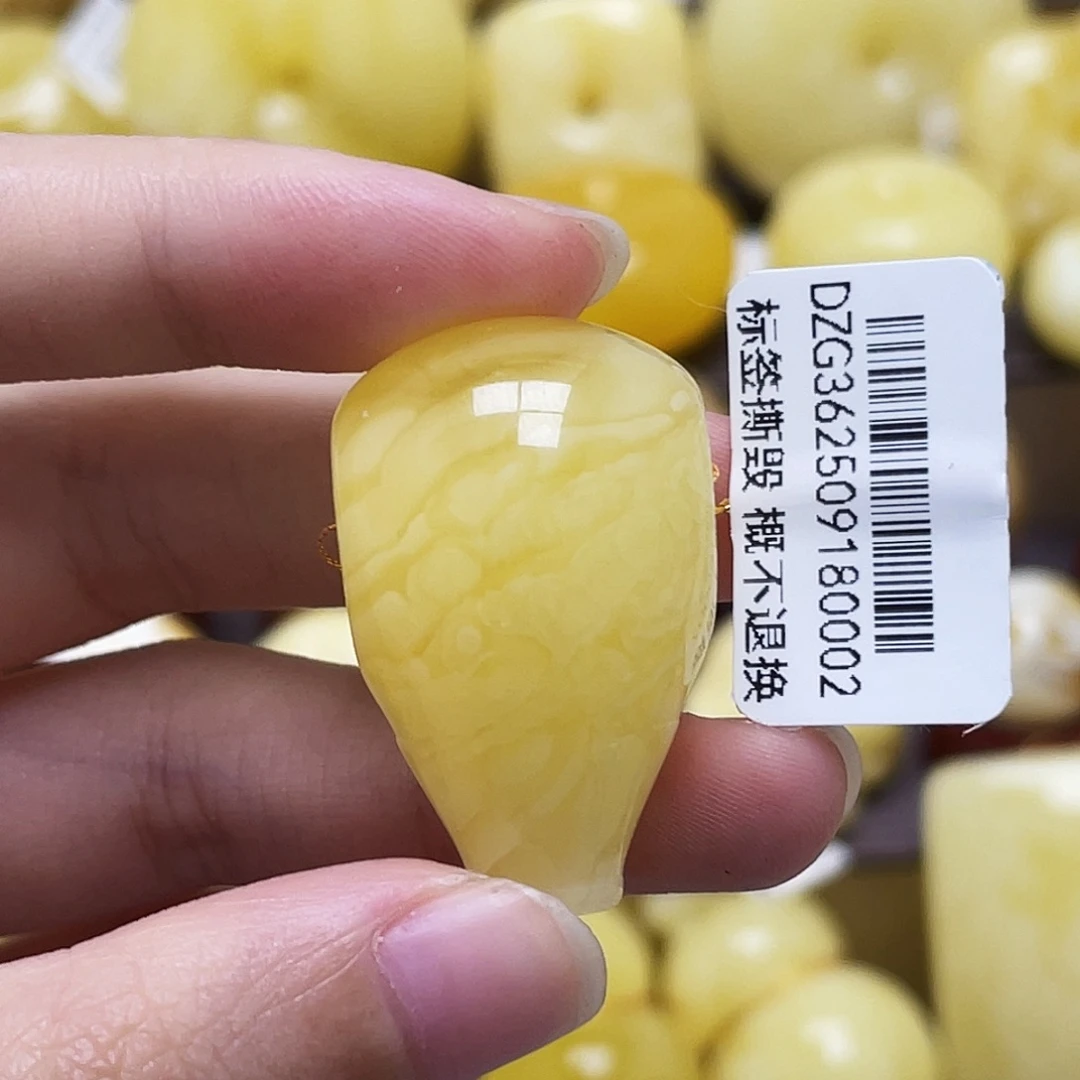 琥珀未镶嵌裸石20*31.8mm金妖溶洞虎皮三通瑕