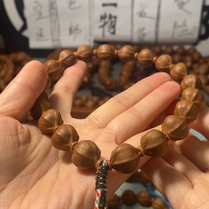 橄榄核手串5131精品蒜头铁核18+2颗+3通