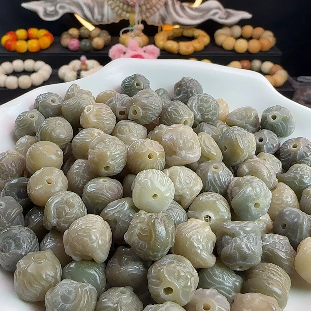 吊坠菩提根/象牙果卡12绿醒狮30颗