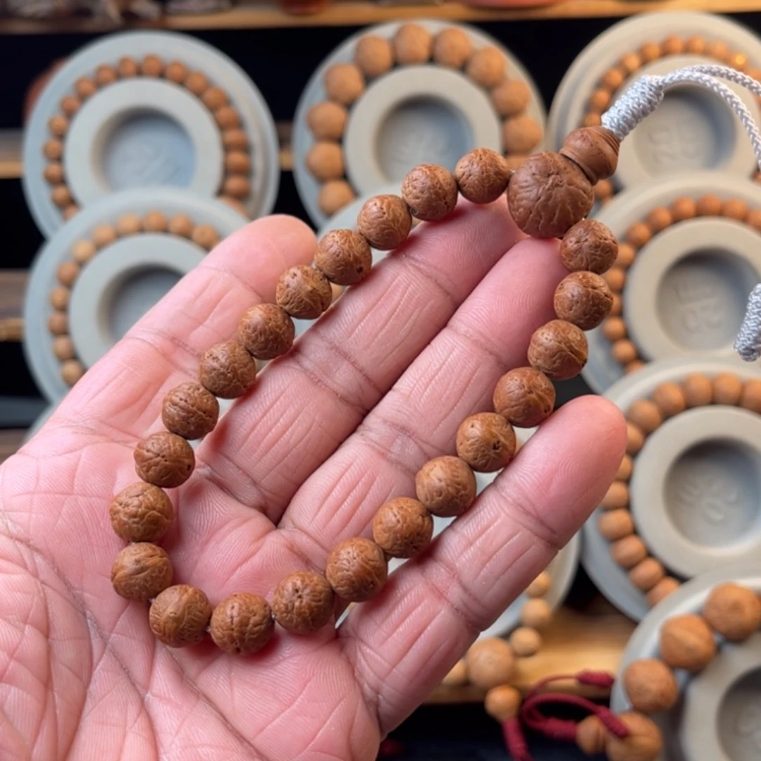 凤眼菩提吊坠张*鹏10.5红油皮同树籽实心籽