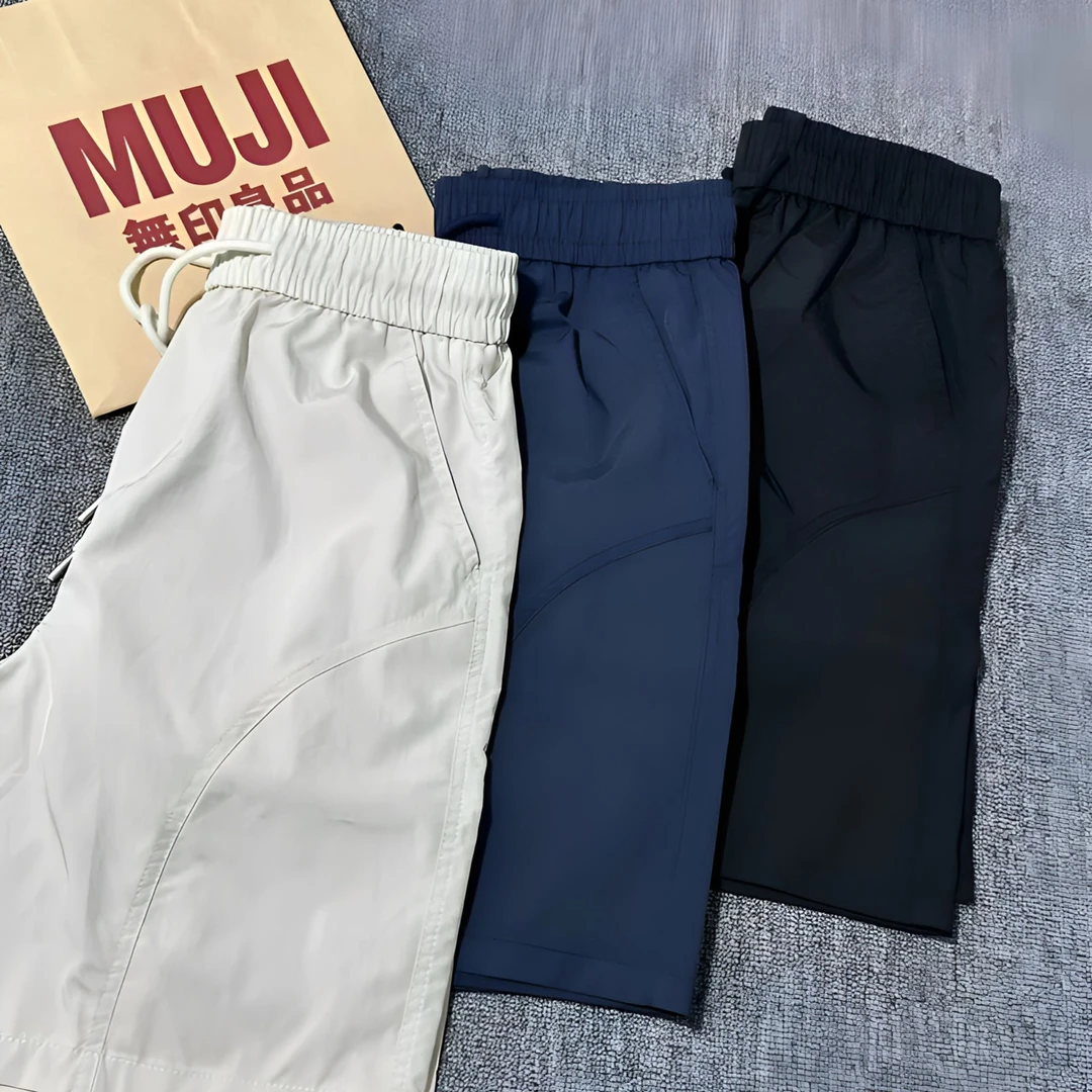 美式斜切速干短裤男女夏季潮流拼接宽松五分裤外穿薄款大码沙滩裤