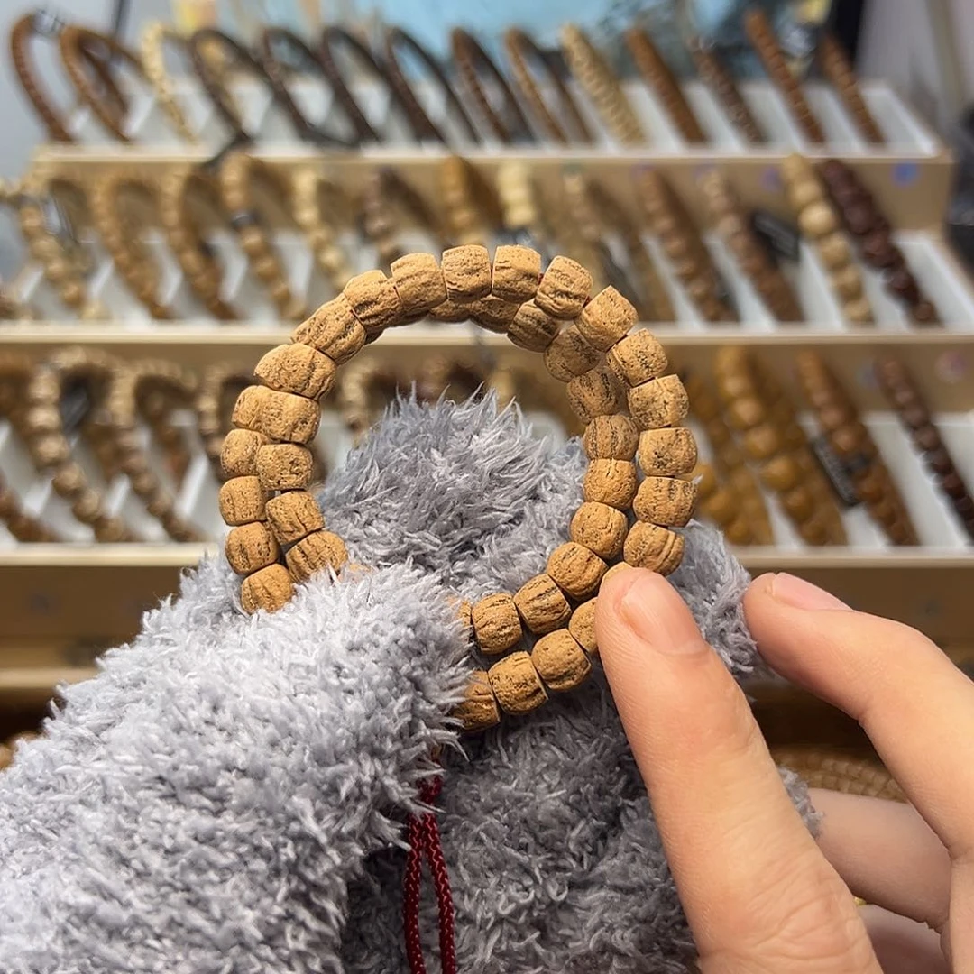 旺****紫金鼠手串百香籽手持8.4