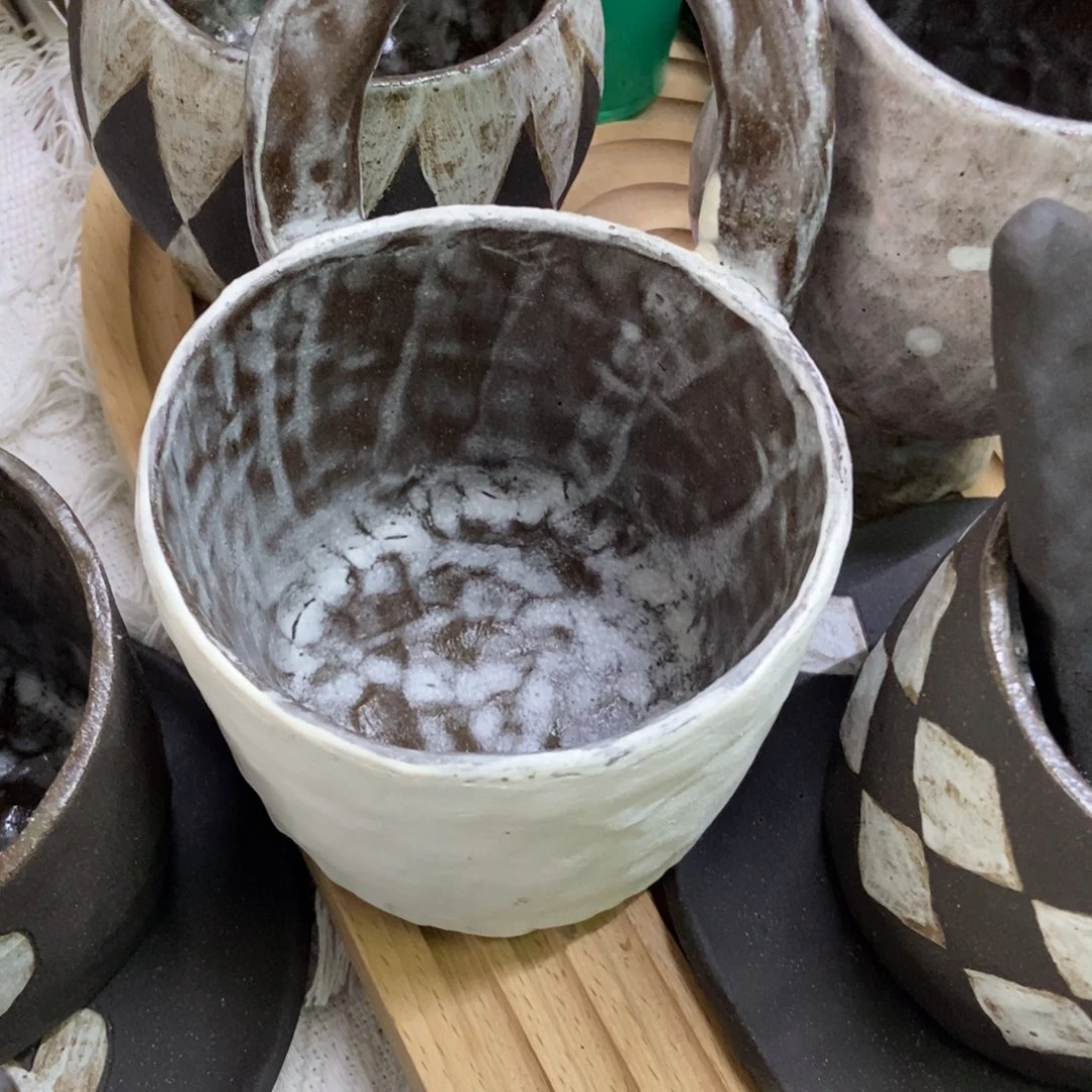 陶瓷王****0手捏双耳碗微瑕