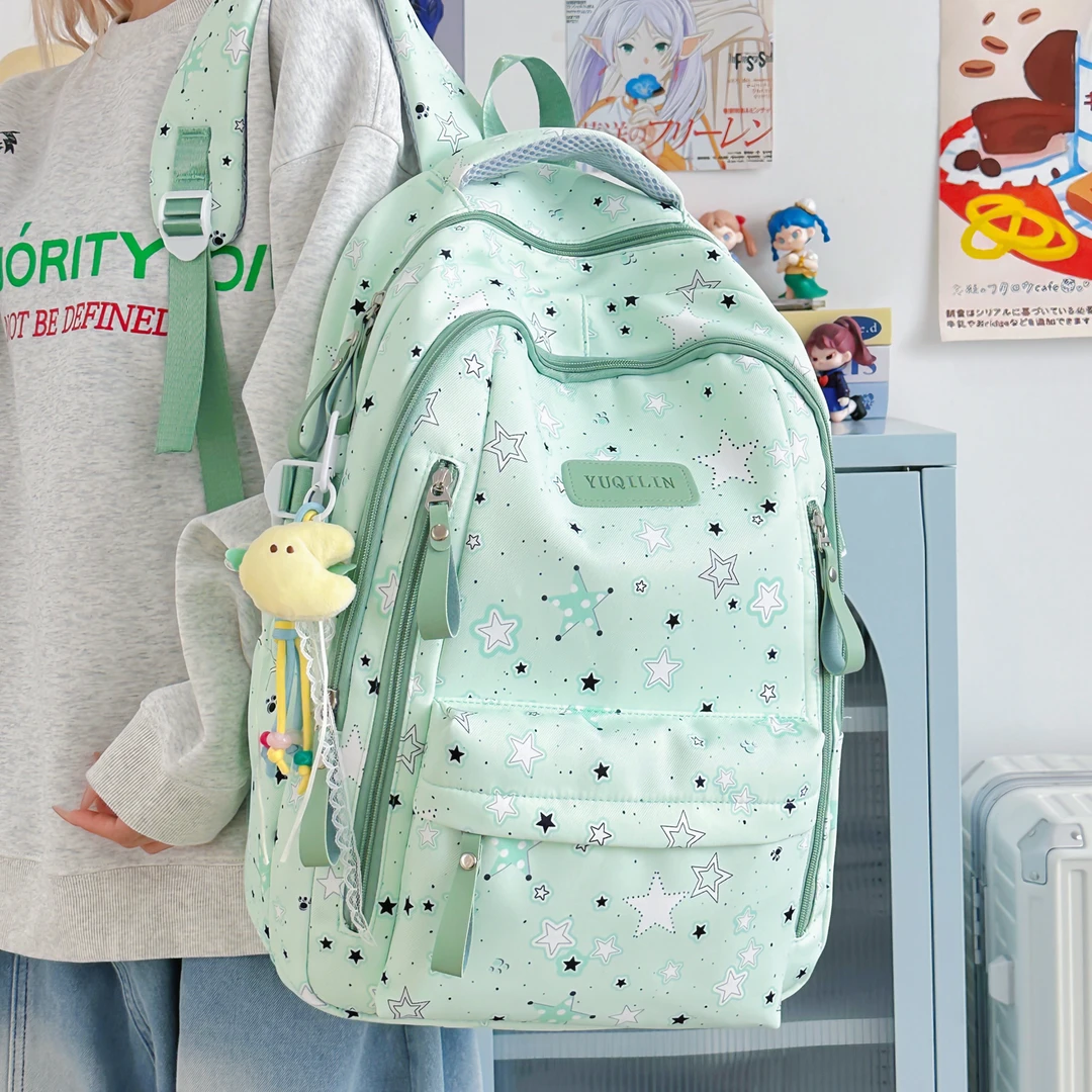 书包2025年新款高颜值初中生星星印花小学生大容量双肩包女中学生