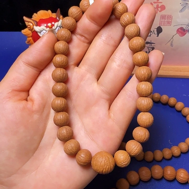 咸***咸吊坠猴头核桃凤羽