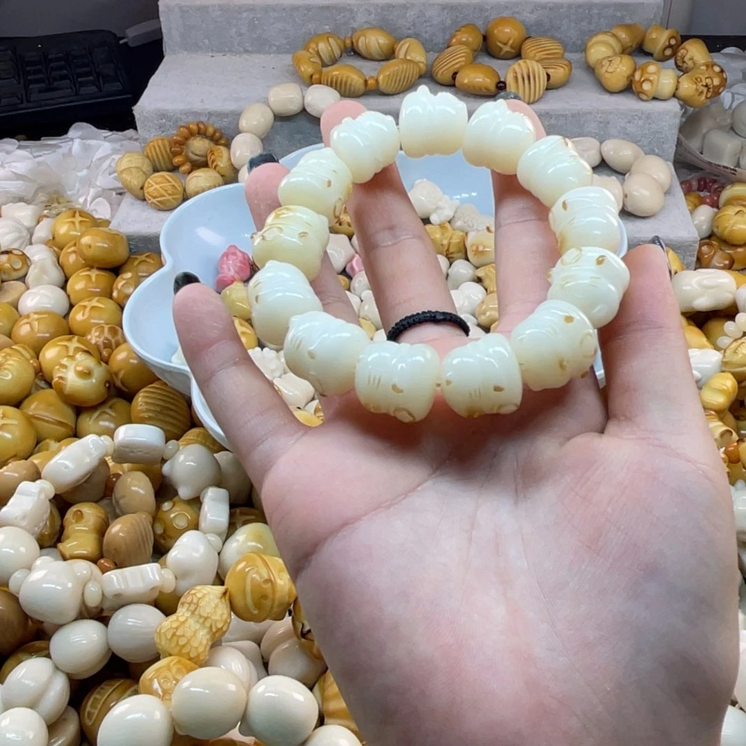 菩提根/象牙果吊坠微瑕菩提炭烤小猫手串