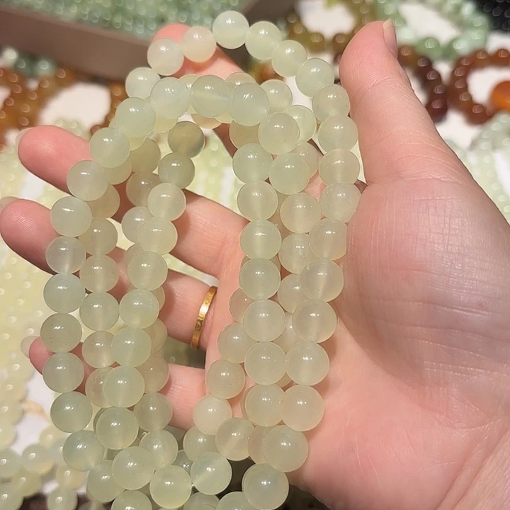 李***）蛇纹石玉未镶嵌手串