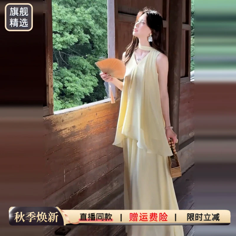 法式高级感黄色吊带连衣裙夏季洋气衣服女百搭纯欲慵懒风女装