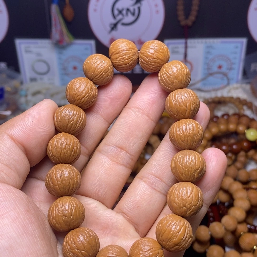 汉***貂猴头核桃手串凤羽