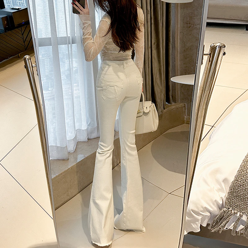 米白蝴蝶结高腰微喇牛仔裤女2025秋季新款显瘦时尚设计感百搭毛边