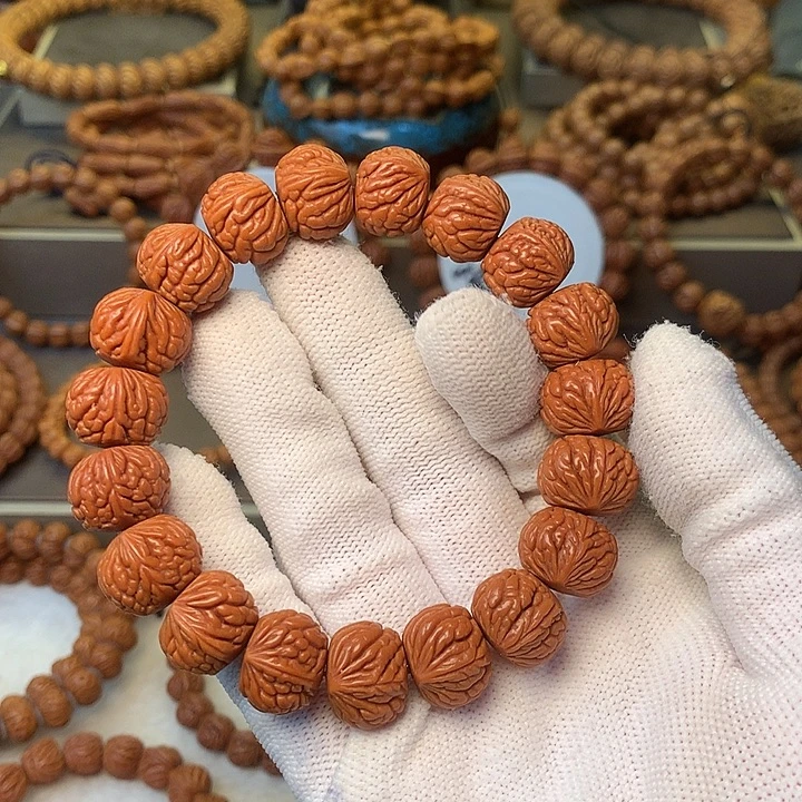 樊***7手串桃核秦岭龙纹