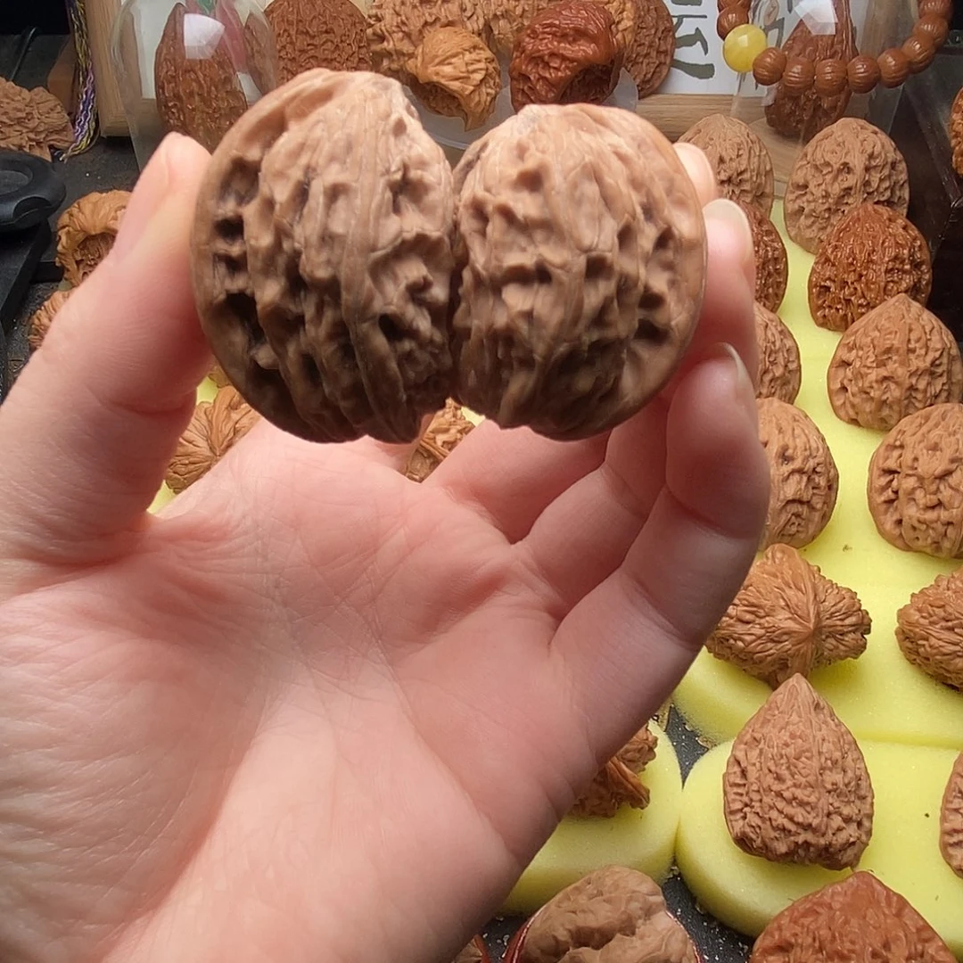 文玩核桃把件磨盘子母果