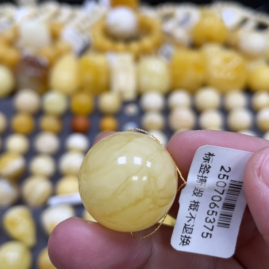 蜜蜡未镶嵌裸石21.4mm瑕疵妖花
