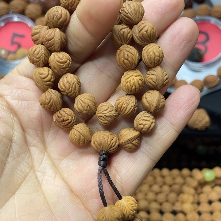 红****把件桃核小金豆手持10尺寸36颗无修