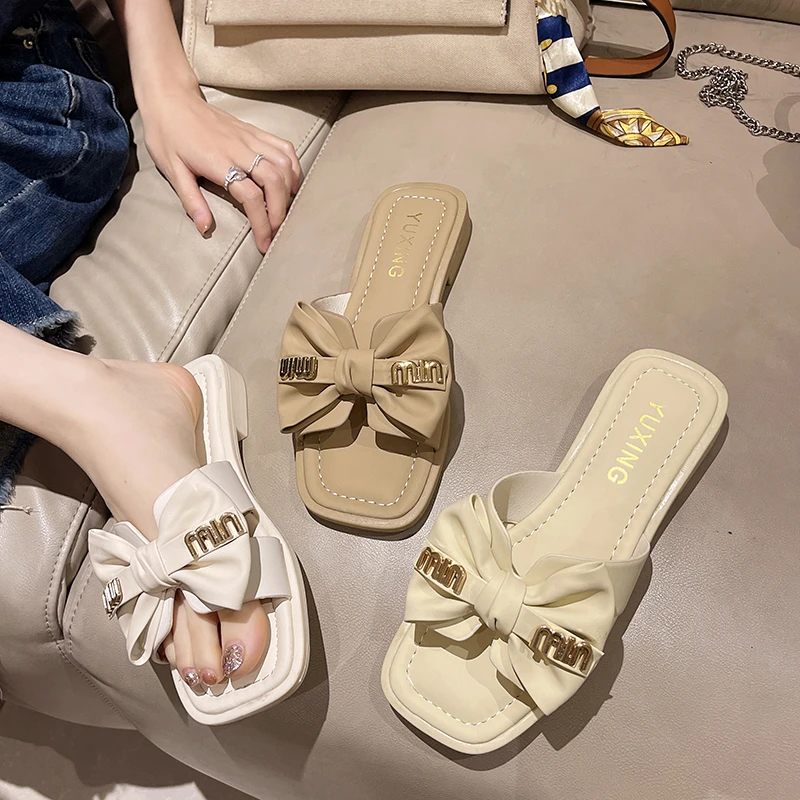 纯色平跟2025新款沙滩鞋包头网红夏季防滑凉拖鞋蝴蝶结一字拖