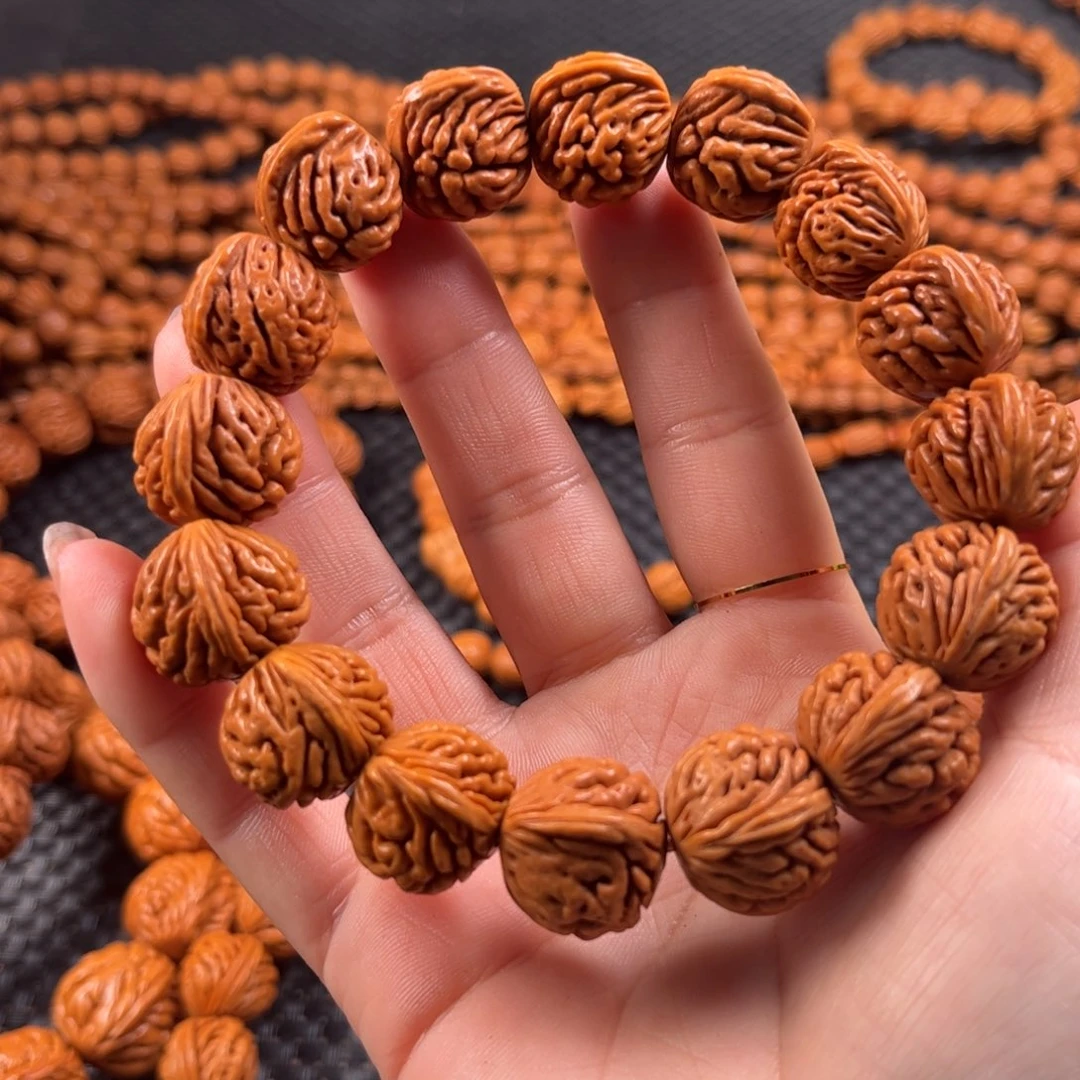 宜***窗桃核手串Y7链接手串