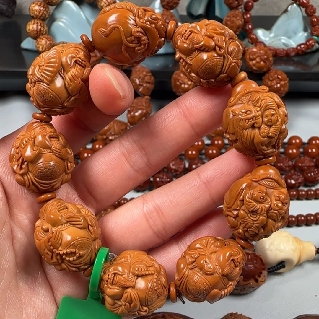 手串橄榄核1.95骑兽童子财神