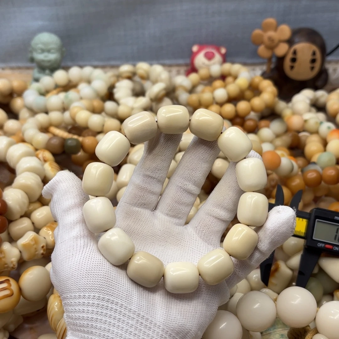 吊坠菩提根/象牙果18干磨瑕疵牙果年糕660