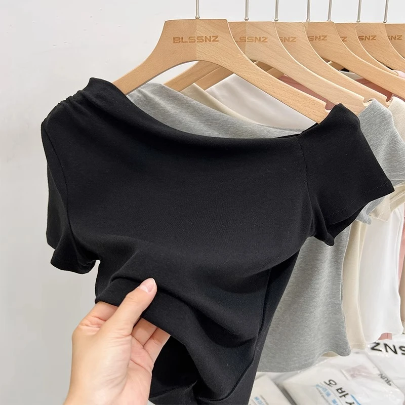 黑色露肩短袖女t恤夏2025新款不规则设计感小众修身显瘦斜肩上衣