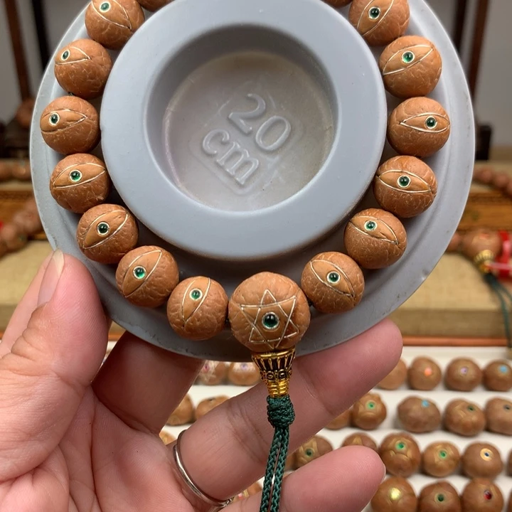 雪***中凤眼菩提吊坠手串