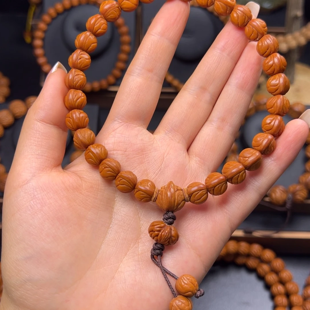 佑***丶手串桃核野生玉龙脊10