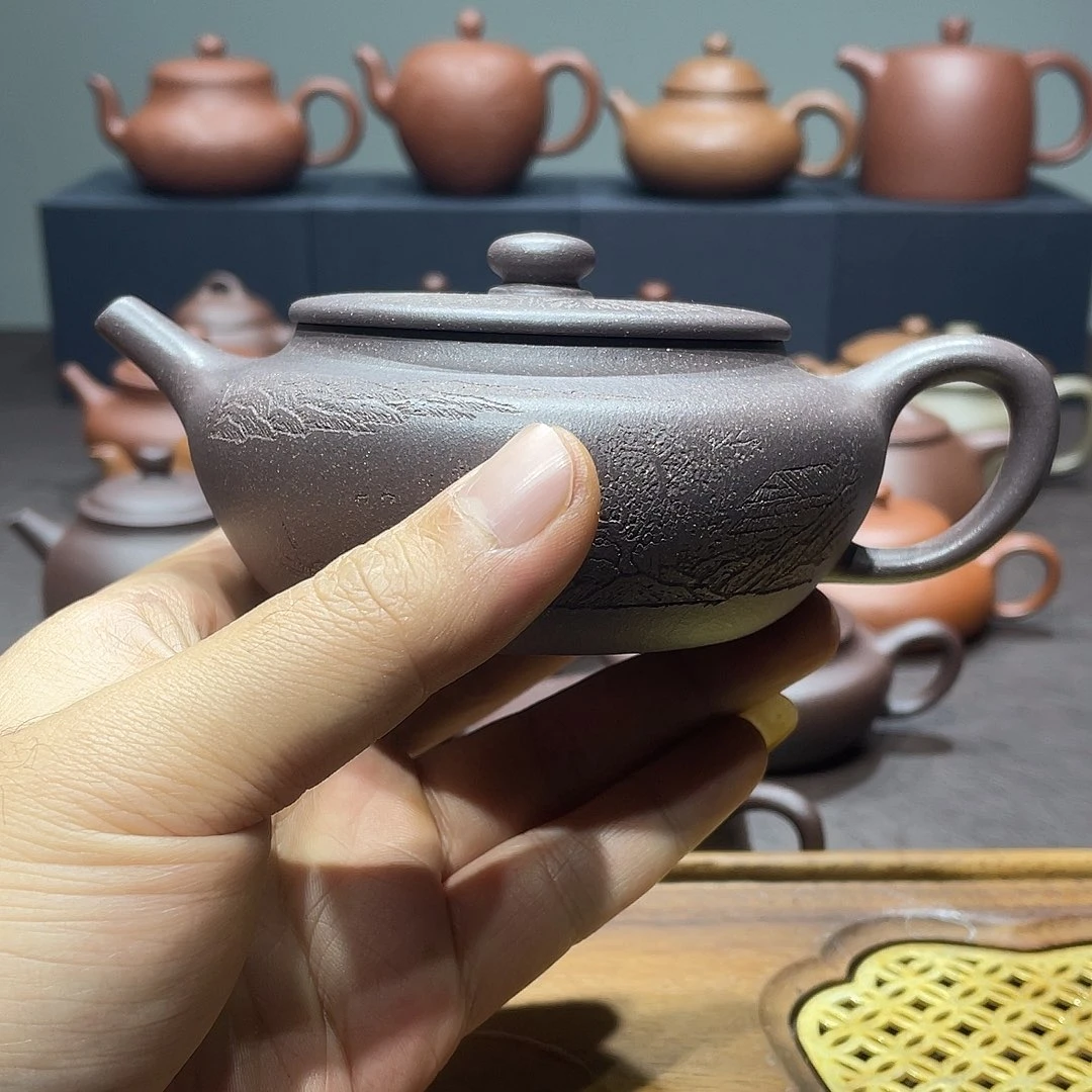 紫砂茶壶东**人青灰扁晨