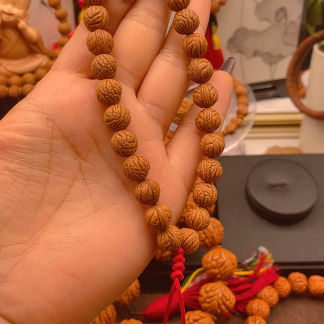 ζ***゛手串桃核红红火火。红红火火