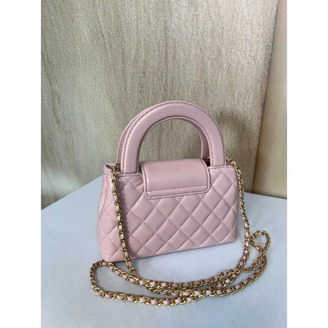 TOLEX2024新款手工时尚油蜡一代半圆女包粉色百搭