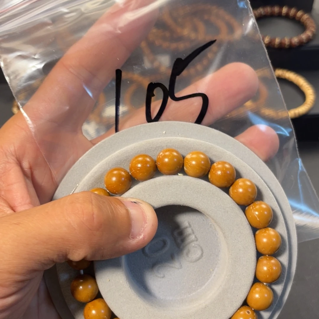 溪****紫金鼠手串11半实心光珠L05