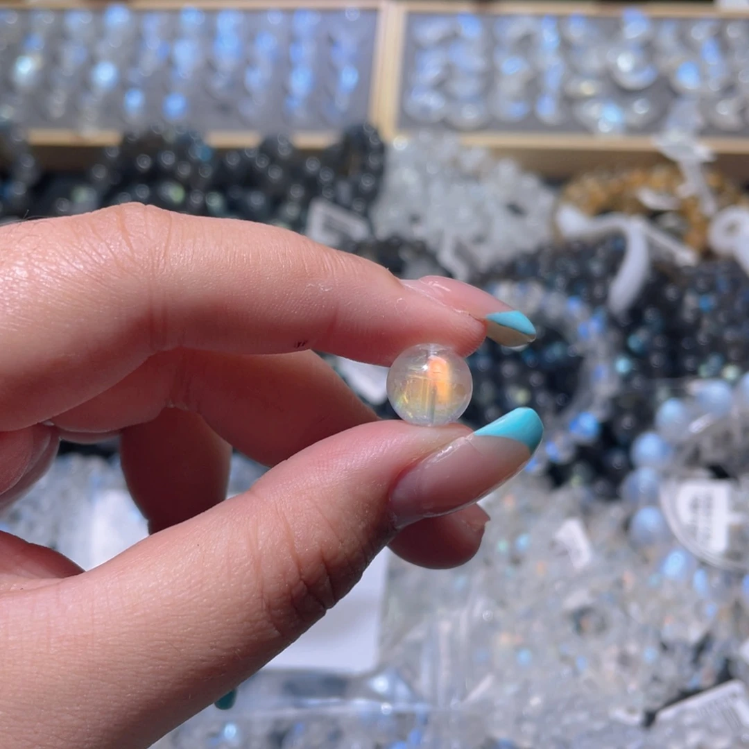 踽***踽长石裸石马岛幻彩月光石单珠11.1