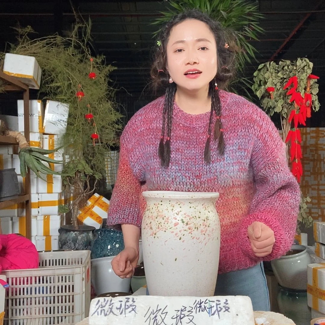 红陶陌**开花盆里的小猫咪q