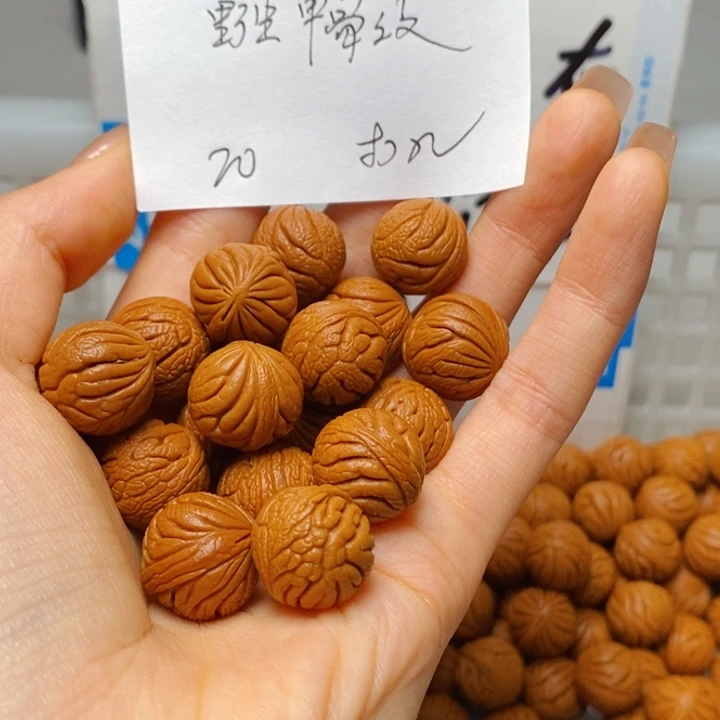 桃核手串15mm左右野生甲骨纹20颗（打孔）