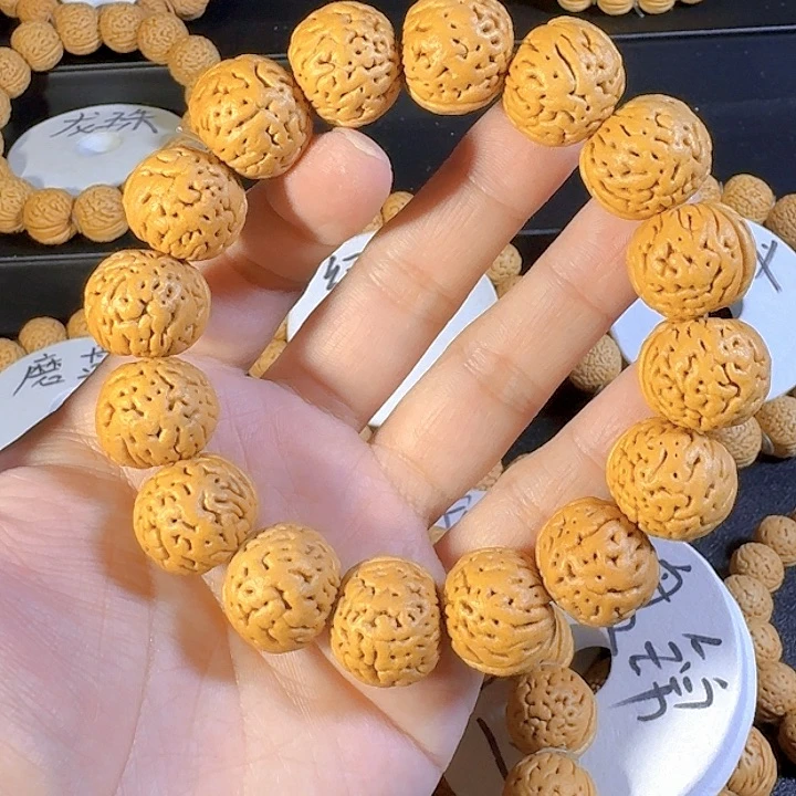 *****桃核吊坠盘锦奶豆桃核