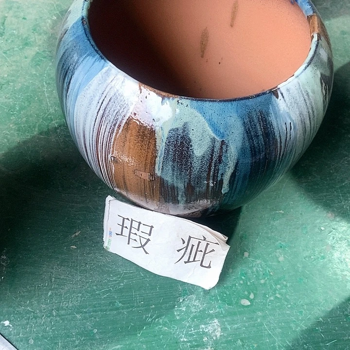 红陶口21。高22.5。。