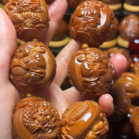 吖****手串/手链橄榄核龙财