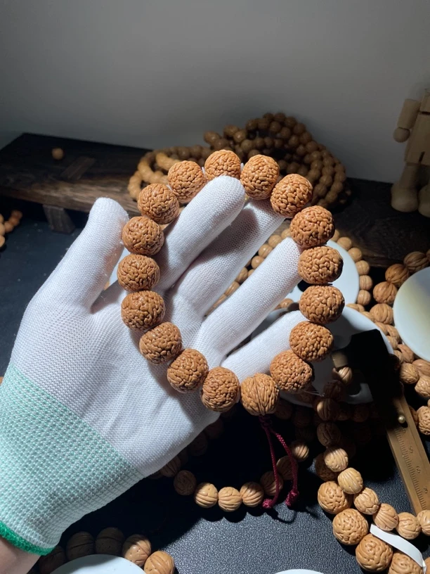 桃核手串龙鳞凤尾