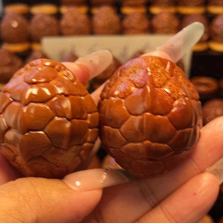 尔***滨把件橄榄核橄榄雕刻